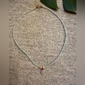 Blue and white shell pendant charm necklace with pearl details